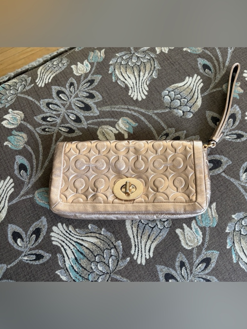 Coach Rose Gold Wristlet.